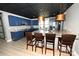 Spacious kitchen featuring a large island, stainless steel appliances, and custom blue cabinetry at 2757 Trent Ne Dr, Conover, NC 28613