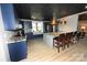 Open-concept kitchen with a large island, seating, and views into the adjacent living area at 2757 Trent Ne Dr, Conover, NC 28613
