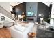 Expansive living room with soaring ceilings, modern fireplace, stylish furnishings, and abundant natural light at 2757 Trent Ne Dr, Conover, NC 28613