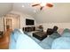 Large bonus room with comfortable seating, large TV and hardwood floors at 2757 Trent Ne Dr, Conover, NC 28613