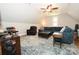 Spacious bonus room with plush seating, overhead fan and ample natural light at 2757 Trent Ne Dr, Conover, NC 28613