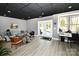 Finished basement featuring a cozy sitting area, french doors and ample natural light at 2757 Trent Ne Dr, Conover, NC 28613