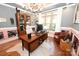 Home office boasts natural light, stylish decor, and hardwood floors at 2757 Trent Ne Dr, Conover, NC 28613