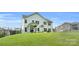Enjoy the home's spacious backyard and outdoor seating area at 3081 Montreaux Valley Dr, Fort Mill, SC 29707
