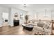 Comfortable living room with hardwood floors, modern decor, and plenty of natural light at 3081 Montreaux Valley Dr, Fort Mill, SC 29707