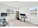 Office space with a desk, chair, exercise bike, and two windows bringing in lots of natural light at 3081 Montreaux Valley Dr, Fort Mill, SC 29707