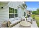 Relax on this home's patio featuring comfortable seating and a convenient outdoor area at 3081 Montreaux Valley Dr, Fort Mill, SC 29707