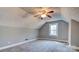 Spacious attic room with dormer window and carpet flooring at 310 S Poston St, Shelby, NC 28150