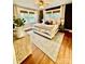 Comfortable bedroom with wood floors, large windows, ceiling fan, and neutral decor at 310 S Poston St, Shelby, NC 28150