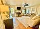 Cozy living room with hardwood floors, a fireplace, and comfortable seating at 310 S Poston St, Shelby, NC 28150