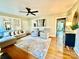Bright and airy living room with hardwood floors, neutral furnishings, and natural light at 310 S Poston St, Shelby, NC 28150