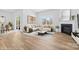 Bright living room with a fireplace, modern decor, and ample natural light at 3664 Mercer St, Terrell, NC 28682