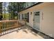Exterior view of home with a small front porch, featuring black shutters and a cream color exterior at 3713 Capricorn Rd, Lancaster, SC 29720