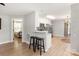 The modern kitchen flows into other living spaces, with bar seating available at 3713 Capricorn Rd, Lancaster, SC 29720