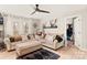 Cozy living room with plush seating, a ceiling fan, and natural light at 3713 Capricorn Rd, Lancaster, SC 29720