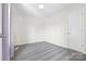 Comfortable bedroom with plush carpet and ample natural light at 415 French St, Charlotte, NC 28216