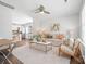 Bright living room featuring hardwood floors, a neutral color scheme, and stylish modern furniture at 415 French St, Charlotte, NC 28216