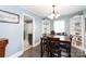Dining room with wood table, chairs, chandelier and built-in shelving at 427 Spencer St, Rock Hill, SC 29730