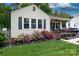 Charming home featuring lush landscaping and a cozy front porch at 427 Spencer St, Rock Hill, SC 29730