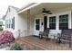 Inviting front porch with seating and charming decorative details at 427 Spencer St, Rock Hill, SC 29730