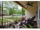 Relaxing front porch with chairs, decorative plants, and views of the neighborhood at 427 Spencer St, Rock Hill, SC 29730