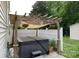 Backyard hot tub with a pergola and white privacy fence for relaxing outdoors at 427 Spencer St, Rock Hill, SC 29730