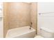 Bathroom featuring shower-tub combination, tiled walls and a toilet at 4333 Sawmill Trace Dr, Charlotte, NC 28213