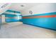 The bedroom features vibrant blue walls and an orange stripe at 4333 Sawmill Trace Dr, Charlotte, NC 28213