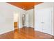 Bedroom with hardwood floors, neutral paint, walk in closet and bathroom at 4333 Sawmill Trace Dr, Charlotte, NC 28213