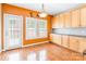 Cozy dining area with hardwood floors and large windows, creating a warm and inviting atmosphere at 4333 Sawmill Trace Dr, Charlotte, NC 28213