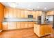 Well-equipped kitchen featuring stainless steel appliances, ample counter space, and center island at 4333 Sawmill Trace Dr, Charlotte, NC 28213