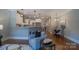 Cozy living room with a view of the kitchen, hardwood floors and modern furniture at 439 Beacon Nw St, Concord, NC 28027