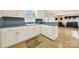 Clean kitchen with countertops, wooden floors and view to living room at 4462 Flat Creek Rd, Heath Springs, SC 29058