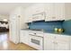 Functional kitchen with white appliances, ample counter space, and classic design at 4462 Flat Creek Rd, Heath Springs, SC 29058