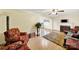 Spacious living room with views into the kitchen and plenty of seating at 4462 Flat Creek Rd, Heath Springs, SC 29058