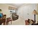 Cozy sitting area with a comfortable recliner, piano, and ample storage at 4462 Flat Creek Rd, Heath Springs, SC 29058
