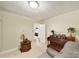 Comfortable sitting area with a piano, side table, and doorway access to another room at 4462 Flat Creek Rd, Heath Springs, SC 29058