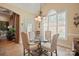 Bright breakfast nook featuring a glass-top table, chairs, and lots of natural light at 5016 Woodwinds Ne Dr, Hickory, NC 28601