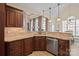 Well-appointed kitchen with granite countertops, stainless steel appliances, and ample cabinet space at 5016 Woodwinds Ne Dr, Hickory, NC 28601