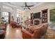 Expansive living room featuring high ceilings, hardwood floors, a fireplace, and a view into the foyer and dining area at 5016 Woodwinds Ne Dr, Hickory, NC 28601
