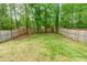 Spacious back yard with new fence, hammock and room to relax at 523 Tribune Dr, Charlotte, NC 28214