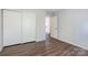 Bedroom with closet and neutral walls and light flooring at 523 Tribune Dr, Charlotte, NC 28214