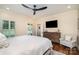 The main bedroom offers hardwood floors, plantation shutters, and an ensuite bathroom at 6419 Gilead Rd, Huntersville, NC 28078
