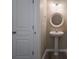 Charming powder room features a pedestal sink, decorative mirror, and stylish fixtures providing a comfortable space at 643 Brickdust Ct, Fort Mill, SC 29708