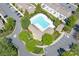 Aerial view of community pool, clubhouse, parking and surrounding landscaping at 643 Brickdust Ct, Fort Mill, SC 29708