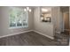 Cozy dining area with an open view to the kitchen and an abundance of natural light at 643 Brickdust Ct, Fort Mill, SC 29708