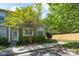 Charming townhome with mature landscaping, stone accents, and a welcoming front entrance at 643 Brickdust Ct, Fort Mill, SC 29708