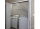 Convenient laundry room with a washer, dryer, and storage shelving provides practicality and ease at 643 Brickdust Ct, Fort Mill, SC 29708