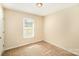 Sunlit bedroom features plush carpet and a bright window that brings in plenty of natural light at 700 Fine Wright Ave, York, SC 29745