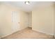 This bedroom features neutral carpet and is complete with two closets for ample storage at 700 Fine Wright Ave, York, SC 29745